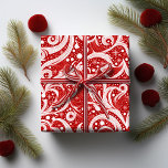 Rode Abstracte sneeuwvlok Patroon#10 ID1009 Cadeaupapier<br><div class="desc">Voeg een vleugje elegantie toe aan uw vakantieseizoen met dit betoverende abstracte kerstpatroon. Met delicate wervelingen en sneeuwvlokken in ongerept wit tegen een felrode achtergrond, vangt dit ontwerp de magie van een winterwonderland. De combinatie van gedurfde kleuren en ingewikkelde patronen maakt dit inpakpapier een perfecte keuze om een pop kleur...</div>