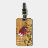 Rode accordeon, zwarte noten, gouden achtergrond bagagelabel (Voorkant verticaal)