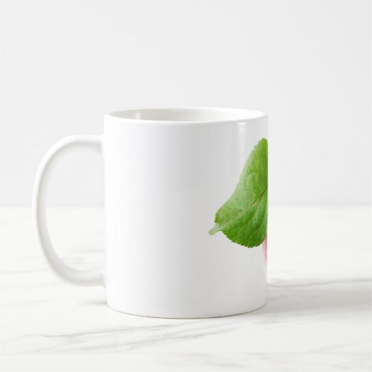 Rode appel van bovenaf koffiemok (Links)