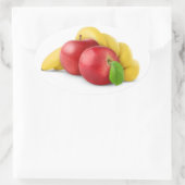 Rode appels en banaan ovale sticker (Tas)