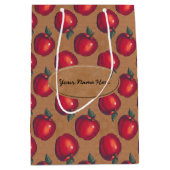 Rode appels op bruin papier medium cadeauzakje (Voorkant)