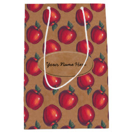 Rode appels op bruin papier medium cadeauzakje