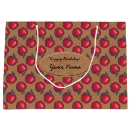 Rode appels op bruine papieren etiketten groot cadeauzakje