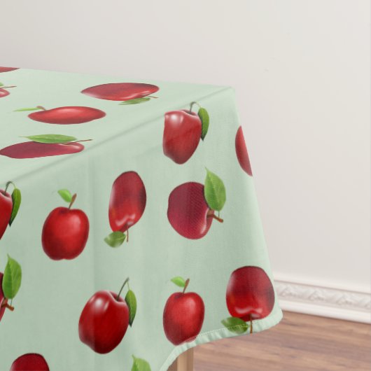 Rode appels op lichtgroene tafelkleed (Voorbeeld)