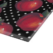 Rode appels wit op zwarte pooldots snijplank (Hoek)