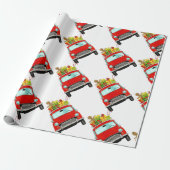 Rode auto met kerstcadeaupapier cadeaupapier (Uitgerold)