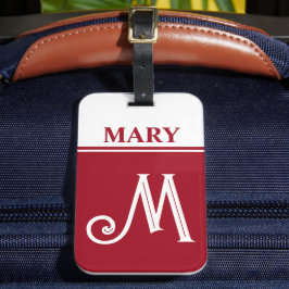 Rode bagagelabel met monogram