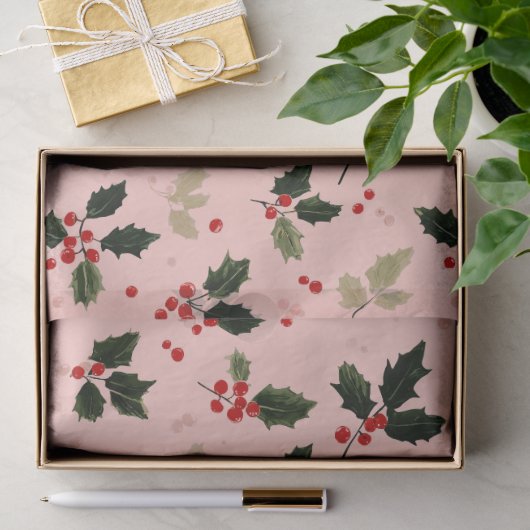 Rode bessen en hulst op roze tissuepapier (Geschenk)