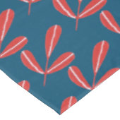 Rode bladeren op blauw tafelkleed (Gekanteld)