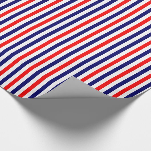 Rode, blauwe, gestripte papierstrips met rode, bla cadeaupapier (Hoek)