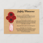 Rode bloem in houten pot met landelijke uitstralin informatiekaartje (Voorkant)