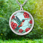 Rode Bloem Kolibrie Zilver Vergulden Ketting<br><div class="desc">Op dit ketting staat een prachtig afbeelding van een kolibrie naast een groep rode bloemetjes. Kleuren in de kolibrie zijn blauw groen en rood, wat een aanvulling is op de afbeeldingen en de lichtblauwe achtergrond. Elegant, helder en kleurrijk! Zorg ervoor dat je de bijpassende oorbellen en sleutelhanger in onze winkel...</div>