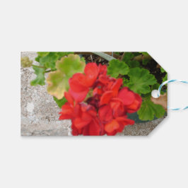 rode bloem tissuepapier cadeaulabel