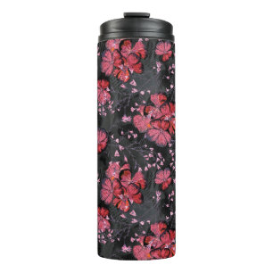 Rode bloemen op een zwart-grijze achtergrond. thermosbeker