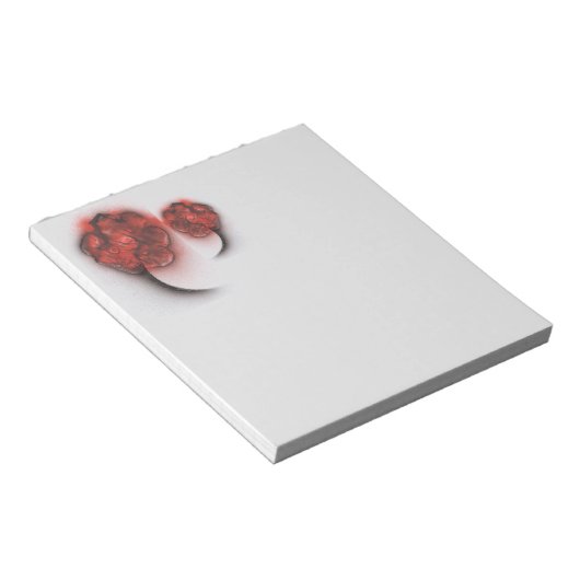Rode bloemen op het gezicht notitieblok (Schuin)
