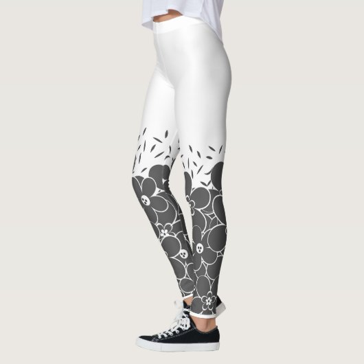 Rode bloemen op witte leggings (Links)