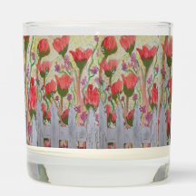 Rode bloemen witte hek