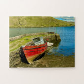 Rode boot bij laagwater legpuzzel (Horizontaal)