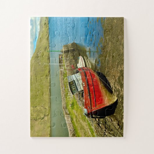 Rode boot bij laagwater legpuzzel (Verticaal)