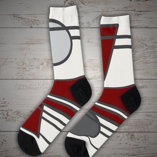 Rode cirkel, driehoek en twee blokken sokken