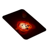 Rode dwergster in een baan rond een hypothetische  magneet (Rechterzijde)