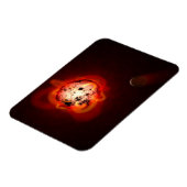 Rode dwergster in een baan rond een hypothetische  magneet (Linkerzijde)