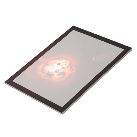 Rode dwergster in een baan rond een hypothetische notitieblok (Schuin)