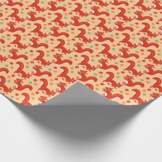 Rode eekhoorns en oranjekleuren cadeaupapier (Hoek)