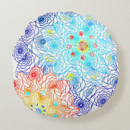 Rode en blauwe kleurrijke bloemen rond kussen