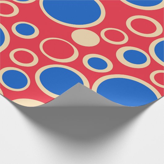 Rode en blauwe Stippen op rood Cadeaupapier (Hoek)
