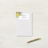 Rode en gele exotische bloemen post-it® notes (Op bureau)