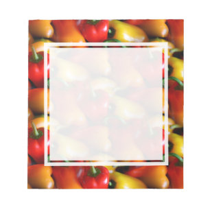 Rode en gele paprika's notitieblok