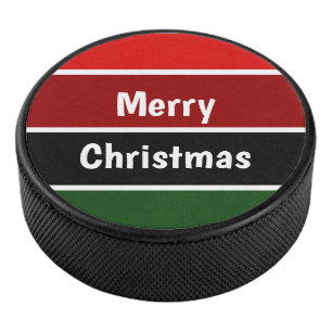 Rode en groene kerst hockey puck