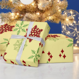 Rode en groene kerstsnowflakes cadeaupapier