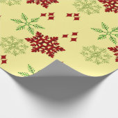 Rode en groene kerstsnowflakes cadeaupapier (Hoek)