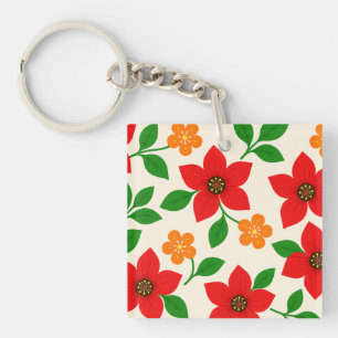 Rode en oranje bloemen met groene bladeren sleutelhanger