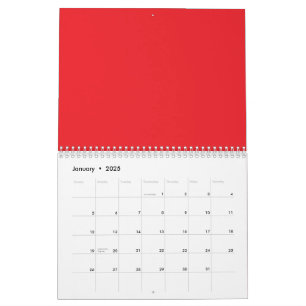 Rode en oranje kleurpotloden liggen naast elkaar i kalender