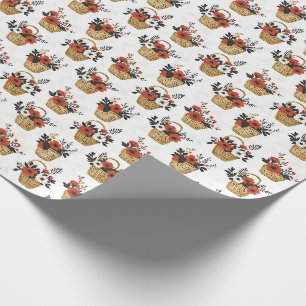 Rode en witte bloemen in manden op wit cadeaupapier