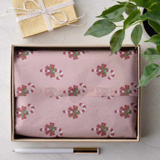 Rode en witte kerst snoepriet patroon op roze tissuepapier (Geschenk)