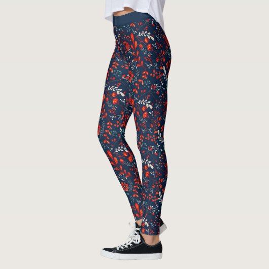 Rode en witte kerstbloemen op donkerblauwe Leggi Leggings (Links)