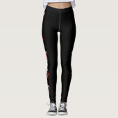 Rode en witte kerstsnoepjes op zwart leggings (Voorkant)