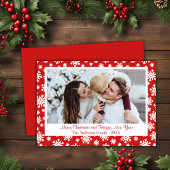 Rode en witte sneeuwvlok kerstfoto feestdagenkaart