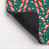  rode en witte snoepstokken op groen muismat (Hoek)