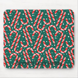  rode en witte snoepstokken op groen muismat