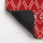  rode en witte snoepstokken op rood muismat (Hoek)