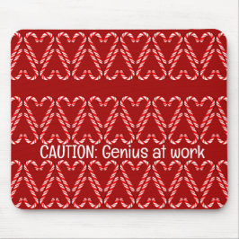  rode en witte snoepstokken op rood muismat