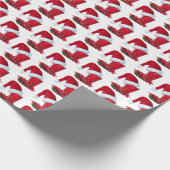 Rode feestbeker met kerstmuts en lint cadeaupapier (Hoek)