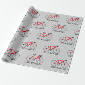 Rode fiets met cycoloog tekst op grijs cadeaupapier (Uitgerold)