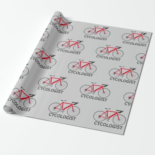 Rode fiets met cycoloog tekst op grijs cadeaupapier (Uitgerold)