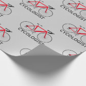 Rode fiets met cycoloog tekst op grijs cadeaupapier (Hoek)